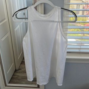 Lululemon open back white tank top. Size 6. No wear/tear.